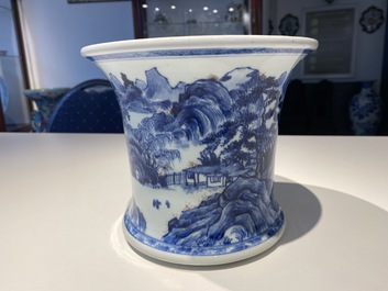 A fine Chinese blue, white and copper red 'Master of the Rocks' brush pot, Kangxi